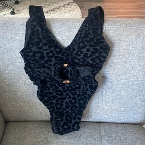 Never worn Toluca one piece